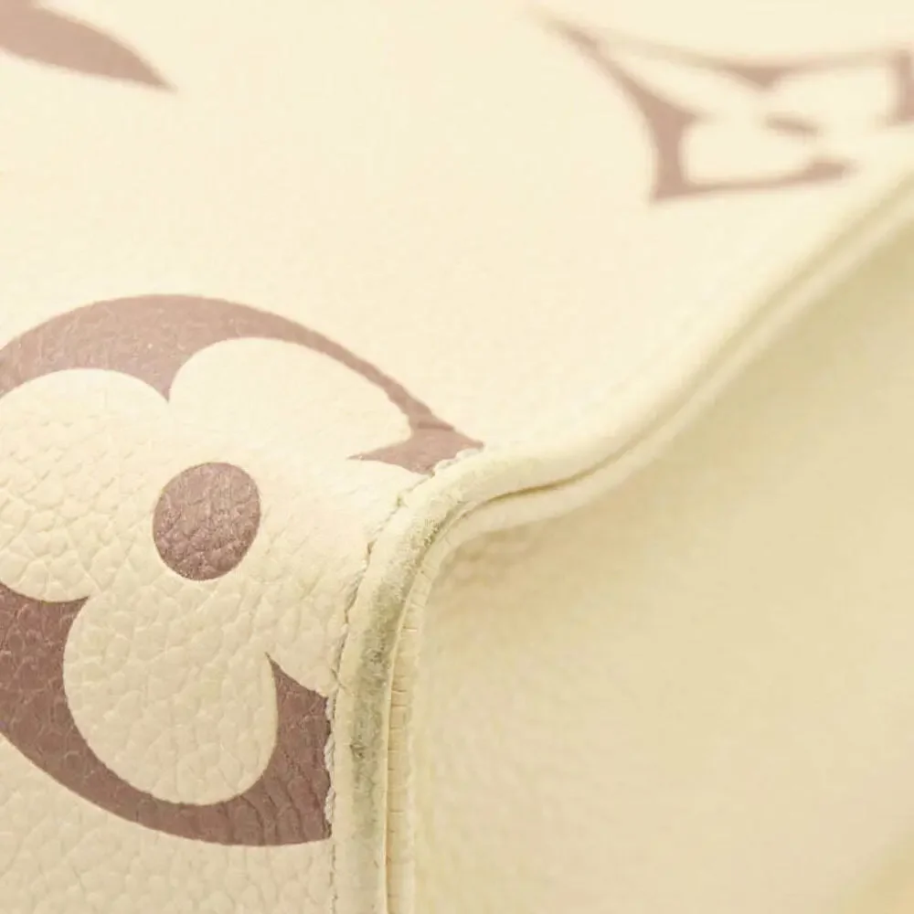 Louis Vuitton  Empreinte Monogram Giant Onthego PM Creme